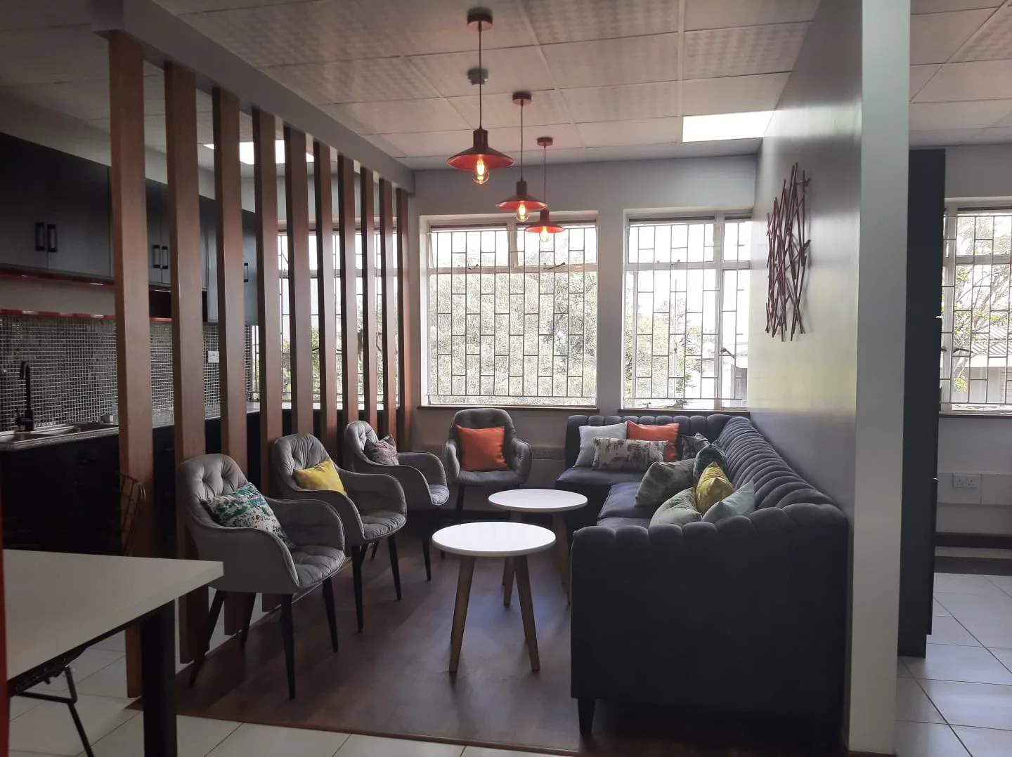 Office lounge with seating and timber dividers