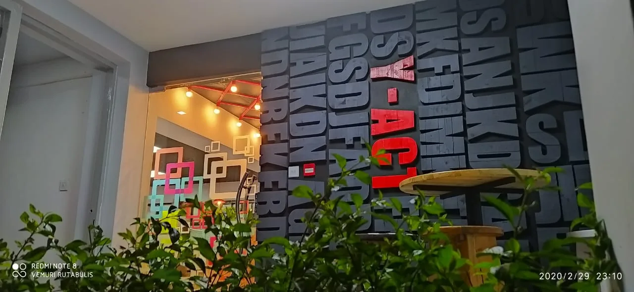 Y-ACT branded office entry wall